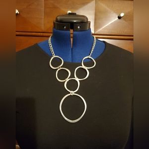 Silver hammer round circle necklace.